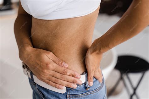 Premium Photo | African american woman feel backache spine pain because ...