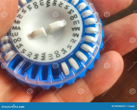 A Blue Circular daily Pill Dispenser for Hormone Replacement Therapy ...