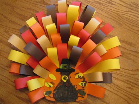 Found the foam turkeys at the craft store. Made paper loops from ...