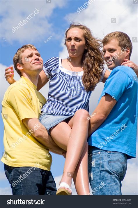 Two Guys Carry Pretty Girl One Stock Photo 14564515 | Shutterstock
