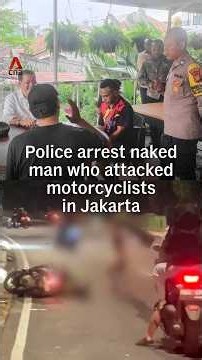 Police arrest naked man who attacked motorcyclists in Jakarta