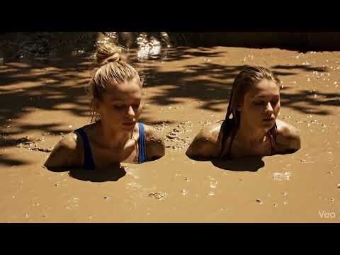 Girls in quicksand mud bath 🚿