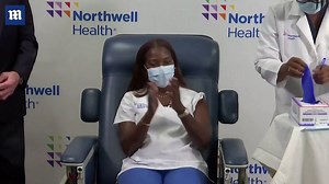 First person in US to receive COVID vaccine gets booster shot