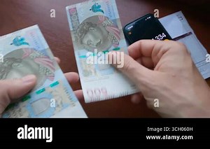 Hands spreading Polish zloty banknotes with calculator on table Stock Video Footage - Alamy