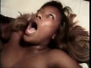 Massive dark python creeps into extremely soaked cave