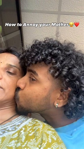 His mom seems getting horny while kissing her neck and cheek