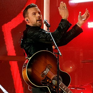 T.J. Osborne Celebrates 2021 CMA Awards Win By Kissing His Boyfriend 9 Months After Coming Out