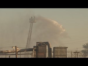 Phoenix recycling fire continues to smolder