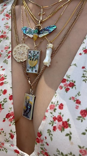 Worn together, these tarot pendants remind us to lean on our friends for support when heartbroken🤍 #roseark #tarot #threeofswords #threeofcups | Roseark