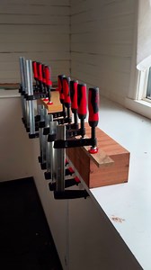 Getting the pin centered in a dowel is one of the hardest parts of making wood hinges. I drill a larger hole first, clamp the hardwood block in the drill press with Bessey, and keep it fixed while switching to a smaller bit. The first hole becomes a guide, so the bit hits the center and makes a clean starting point. Gluing the hinges is also tricky, and having enough strong clamps makes it much easier. I used Bessey clamps 🗜️ | Od form