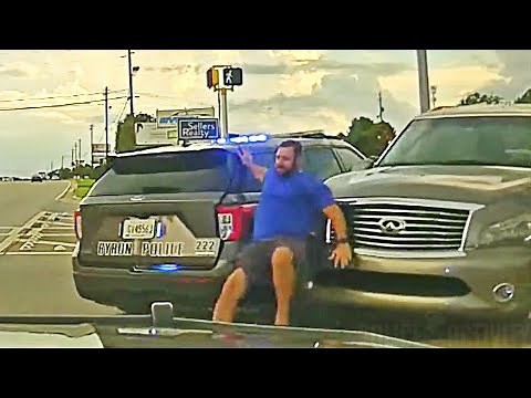 Woman With Child in Car Rams Multiple People & Police Cars While Trying to Avoid Arrest