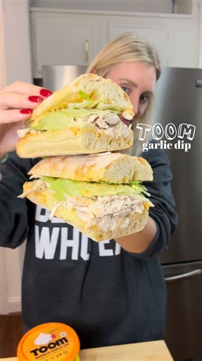 TOOM GARLIC DIPS ⬇️ — If y’all have tried this @Toom #garlicdip you’re missing out! They’ve been our favorite the past year and we usually just lick them out of the container! — Wanted to do something different so made neighbs and I buffalo garlic dip chicken sandwiches!! Only takes 30 minutes, they were absolutely incredible and we highly recommend making them!! #blondeswhoeat #toom #toomgarlicdip | Blondes Who Eat