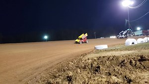 Cars are circling the I-30 Speedway, getting ready to Hot Lap. | American Sprint Car Series