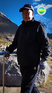 🔱🕉🙏 A woman sits atop a massive rock, her gaze fixed on Mount Kailash, nestled between two snow-capped peaks. Around her, devotees stand in awe, capturing the moment, while Buddhist prayer flags flutter across the rocky ground, tying earth to sky. #KailashMoments #DivineView #HimalayanSerenity #mtkailash #xizang_China_highlight #himalayas_Meru #kailashyatra2025 #KailashTourVisaSlots | Kailash Mansarovar Yatra - Himalayan Glory Travels