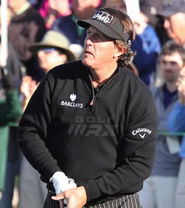 Mickelson lips out a chance at 59