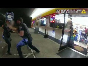 Armed Robbery Suspect Fights Officers and Attempts to Take Officer's Gun During Arrest.