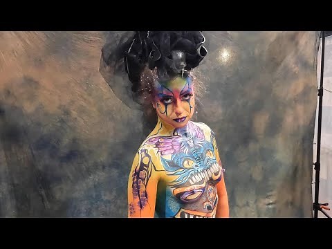 bodypainting a model into a magical cosplay hero, best body art !