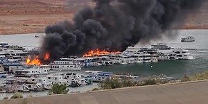 VIDEO: Large fire burns house boats at Lake Powell marina