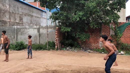 Fun Volleyball Game with Friends at the Beach
