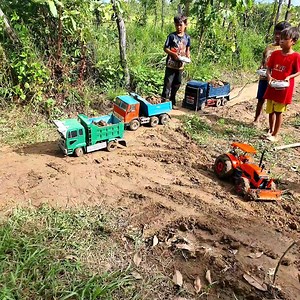 20K views · 1K reactions | RC Kids Toy Truck - Road Building In The Background Are Stunning Dump truck Huge Moving Dirt Power Trator Pushing | SMEY RC Official | Facebook
