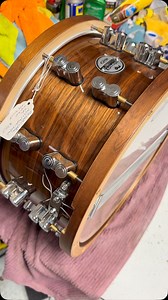 $275 PDP Limited Edition 14x7.5” Maple/Walnut snare drum. Excellent barely used condition. This beautiful PDP limited-edition Dark Stain Maple and Walnut snare drum offers mid to dark, warm, musical tone, custom features and a traditional appearance. The shell features 10 plies of maple enveloped with a beautiful walnut veneer. Matching wood counter hoop provides a round, full rimshot. Also, this drum is fitted with unique Dual-Turret lugs, a DW MAG throw-off and chrome snare wires. | Drum Flip