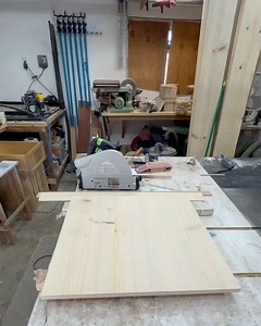 Cutting out the triangles for the corner shelf wine racks. There will...