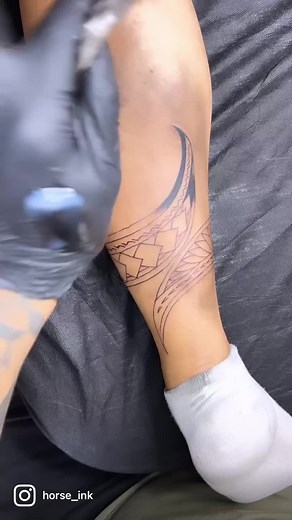 Stunning Geometric Tattoo Close-Up on Lower Leg