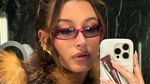 Hailey Bieber looks moody as she poses in fur coat for mirror selfie