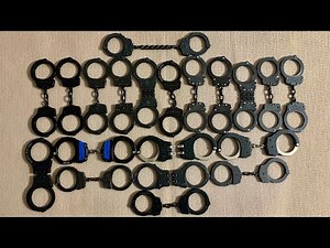 All 20 black handcuffs I own.