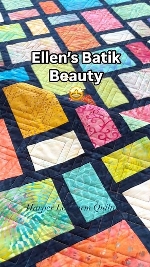 This bright batik beauty was made by Ellen Martens. Nothing gives off that tropical vibe quite like batik fabrics. I love how they all blend together so well. Ellen wanted a simple geometric on this one. Diagonal plaid is my go-to for that simple quilted texture. #harperlongarmquilting #quiltersofinstagram #ilovebatik #batikquilt #batikfabric #batik #quilt #livingincolor | Harper Longarm Quilting