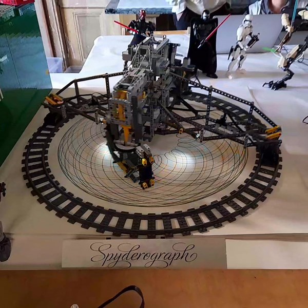 LEGO Movie wheel, printer and spyrograph by Adrian Cuffia and Angelo Dagrada. Seen at San Giorgio C.se Brick Expo 2022 #lego #afol #dynamicmoc #dynamic #moviewheel #printer #legoprinter #spyrograph | The Bricks Box