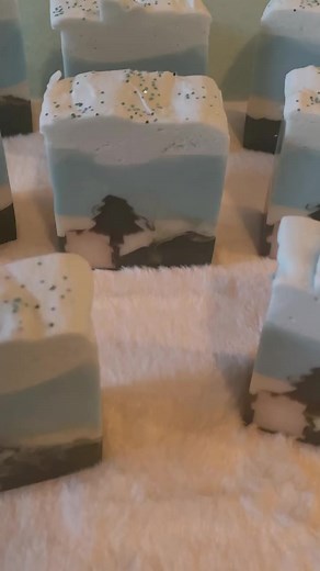 🎄✨ Introducing Our Christmas Sugar Cookie Bar Soap! 🍪🏠Crafted with love, this exquisite artisan soap is a festive delight. 🎁🌟 Imagine a picturesque scene—a white house adorned with intricate details, nestled beside a lush green Christmas tree, all captured in this beautiful bar of soap.Each bar weighs approximately 6.5 oz., meticulously handcrafted with goats' milk soap to offer a luxurious and gentle cleansing experience. 🧼🐐The Sugar Cookie scent, a delightful blend of Essential Oils/Nat