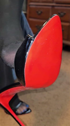 Red bottom high heels and pantyhose