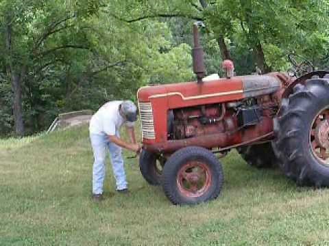 Hand cranking a 1947 McCormick Deering W6