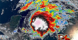 Eta re-strengthens into a tropical storm