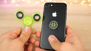 Someone drilled a hole through an iPhone to make a fidget spinner because... the internet