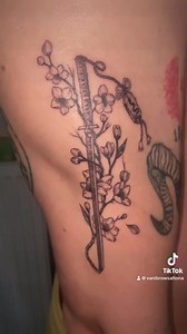 16 reactions | The flower and sword tattoo design symbolizes balance, representing the idea of embracing strength and beauty in life.❤️ . . . . #bodytattoo #bodytattoos #tattoos #finelinetattoos #bodytattoogirls #fine line tattoos artist #tattoosartist #tattooart | Eyebrow microblading- permanent tattoo | Facebook