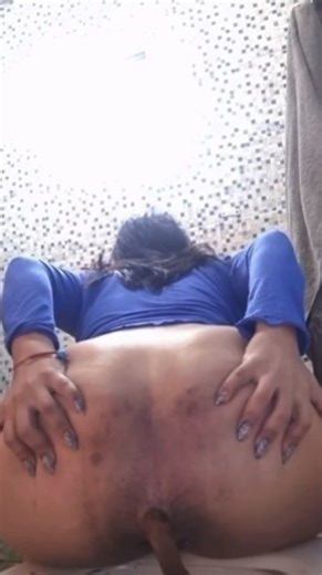 Big booty girl spreads ass pushing big turds on toilet