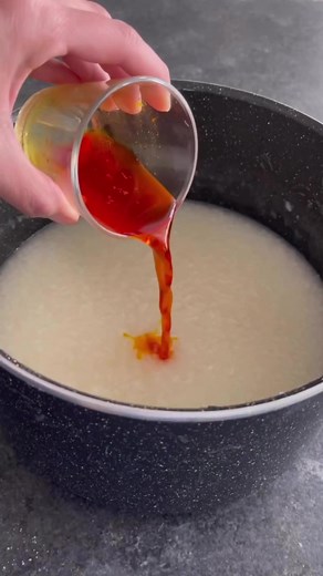 Sholeh Zard (Persian saffron rice pudding) - This delicacy combines the rich aroma of saffron with the creamy texture of rice. Click the link for the full recipe https://www.unicornsinthekitchen.com/sholeh-zard-persian-saffron-rice-pudding/ | Unicorns in the Kitchen