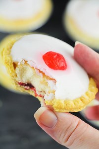Bakewell Tarts are a cherry tart with a baked almond cream center topped with icing and a maraschino cherry. The almond cream bakes to almost a cake-like consistency and is also known as frangipane. We made these Bakewell Tarts for our family's Brave-themed Movie night, but they would also be a special treat for Valentine's Day or Mother's Day. 🍒🍒🍒 #recipes #dessertrecipe #pixar #disney #disneyrecipe #familymovienight #baking The full recipe: Ingredients For the shortcrust: 1 cup flour 1/2 cu