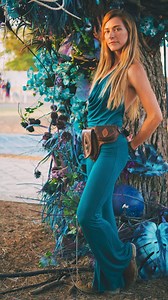 The Umba onesie is a flirty, sexy one piece and is one of our most popular designs. Our onesie jumpsuit features a deep scooping open back and a cowl neck design in the front, to give a loose but fitted look. Pair with the Bell Sleeve Shrug for chillier nights. #onesie #festivalfashion #texaseclipse | Umba Love