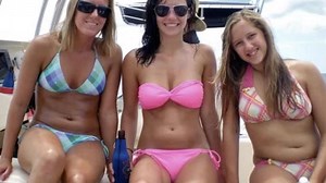 Cute moms and daughters pose nude on the beach