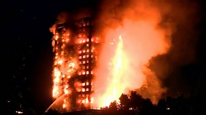 Massive fire engulfs London high-rise, leaves at least 12 dead