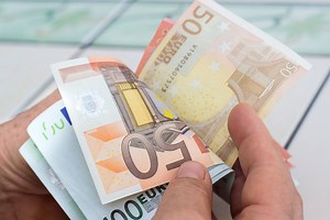 What is Finland's universal basic income scheme?