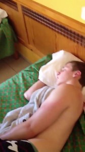 Sleeping dude receives greatest teabagging ever