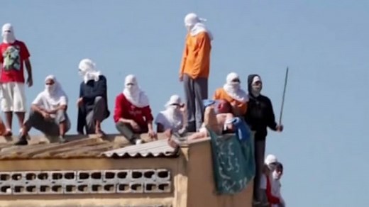 Brazil prison riot: beheadings reported as revolt turns deadly – video report