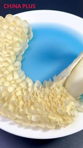 24K views · 247 reactions | A creative chef presented his artwork – a 'white peacock' made of yam and radish, capturing eyes and appetite! The chef has devoted himself to food carving art, aiming to promote this art form. #Horizon #Delicacy #FunChina | China Plus Culture | Facebook