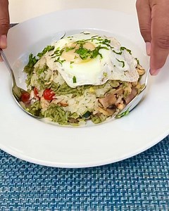 The beauty of our Fried Rice “La China” - camarón, crispy pork, blanco and verde arroz, mushroom, cilantro, heirloom grape tomato, topped with a fried egg! Ready to give it a fried? See you in the restaurants! #nationalfriedriceday | Mesero - Legacy West | Facebook
