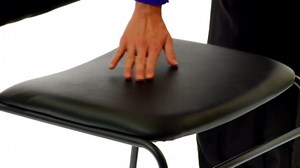 EMMA + OLIVER 500 lb. Capacity High Density Black Vinyl Stacking Chair