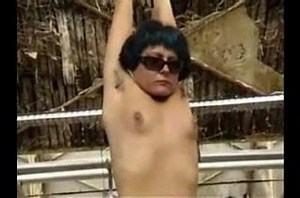 Arms suspended from ceiling and flogging